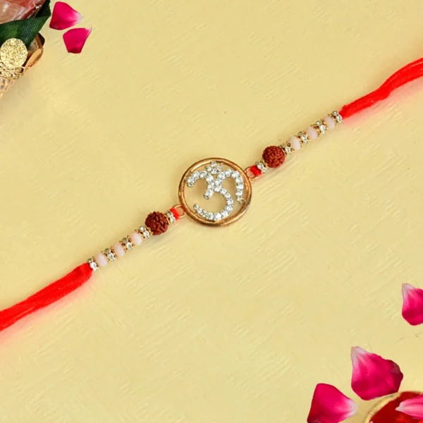 Spiritual Om Rakhi – RK-117 | Red Thread with Rudraksha & Pearl Beads - Image 1
