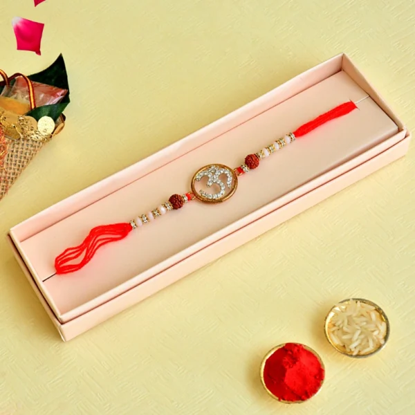 Spiritual Om Rakhi – RK-117 | Red Thread with Rudraksha & Pearl Beads - Image 2