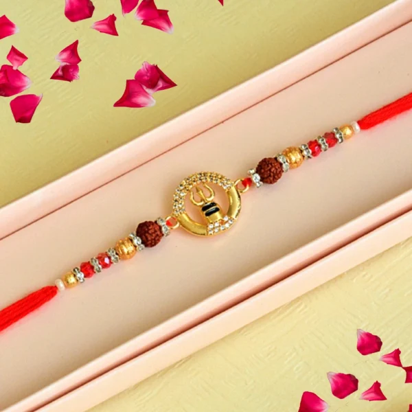 Divine Rudraksha Rakhi – RK-120 | Lord Shiva’s Blessings with Golden Trishul and shivling on Sacred Red Thread - Image 1