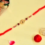 Divine Rudraksha Rakhi – RK-120 | Lord Shiva’s Blessings with Golden Trishul and shivling on Sacred Red Thread - Image 2