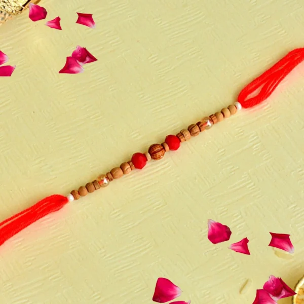 Rustic Charm Rakhi – RK-123 | Traditional Red Thread with Natural Wooden Beads - Image 1