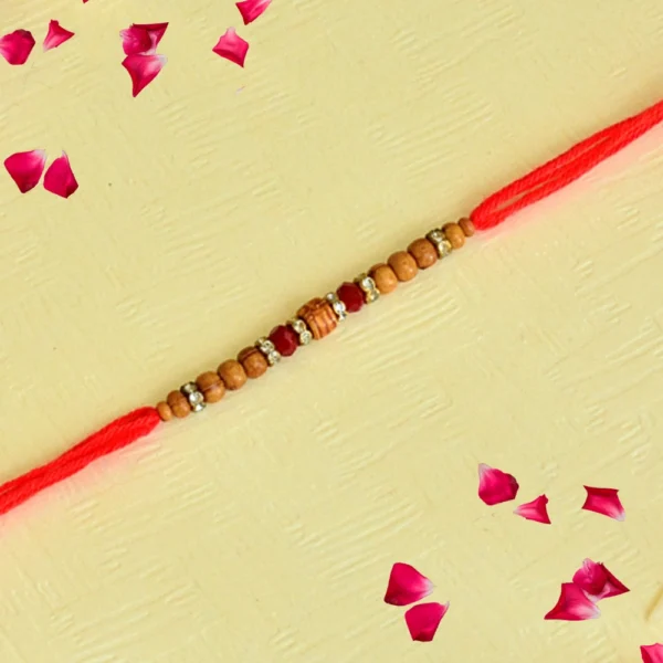 Traditional Wood Bead Rakhi – RK-124 | Minimal Red Thread with Natural Charm - Image 1