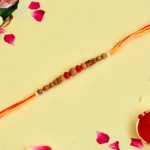 Natural Wooden Beads Harmony Rakhi – RK-127 | Wooden Beads & Red Accents on Sacred Thread