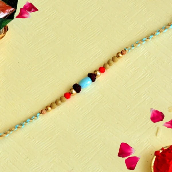 Tribal Touch Rakhi – RK-129 | Braided Blue Thread with Natural Beads & Stone Centerpiece - Image 1