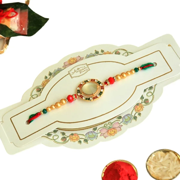 Regal Radiance Rakhi – RK-41 | Circular Kundan Dial with Pearl & Thread Detailing - Image 4