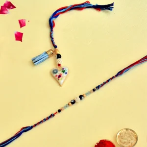 Designer Bhaiya Bhabhi Rakhi Set – RK-135 | Blue-Red Thread with Heart Charm & Beaded Bracelet