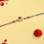 Elegant Peacock Feather with Om Spritual Rakhi - RK-38