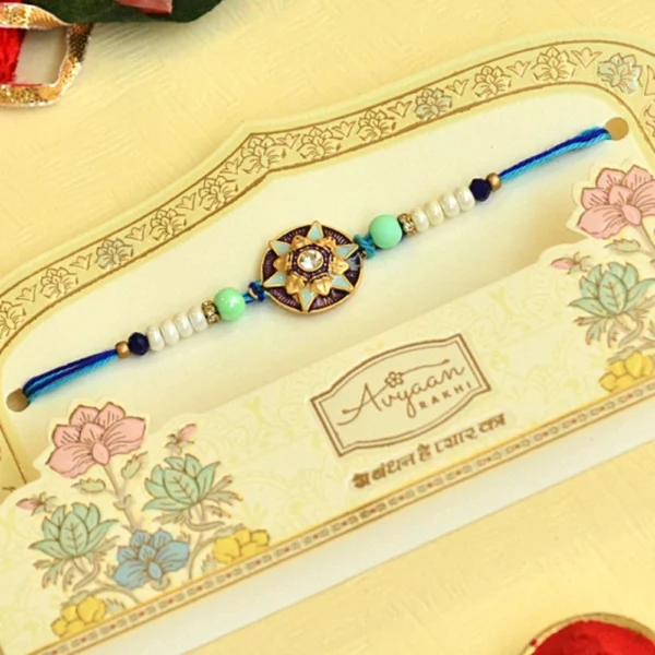 Star Motif Designer Rakhi - RK-39 | Blue Thread with Pearl & Bead Accents