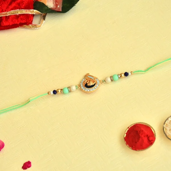 Peacock Theme Rakhi - RK-40 | Elegant Mint Green Thread with Beads & Crystal Accents - Image 2