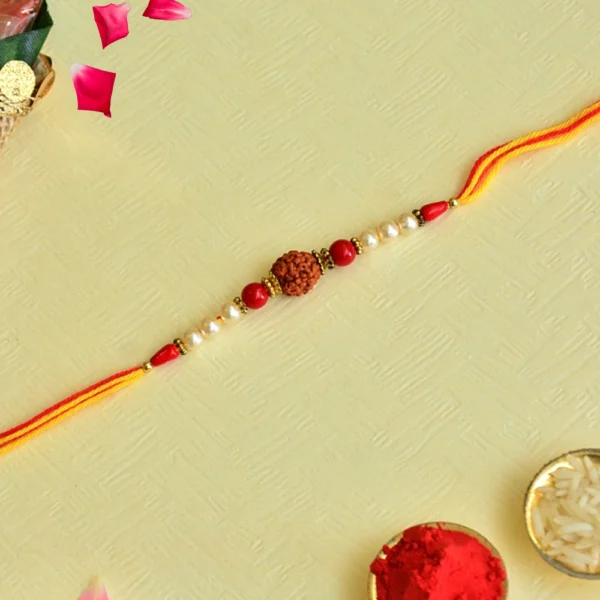 Divine Rudraksha Rakhi – RK-142 | Spiritual Thread with Pearls & Red Beads for Raksha Bandhan - Image 1