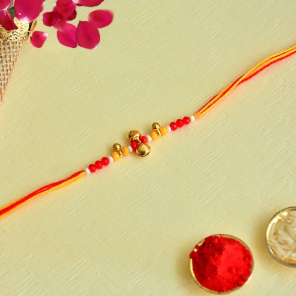 Festive Beaded Bell Rakhi – RK-148 | Joyful Vibrance with Golden Accents - Image 1