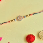 Classic Designer Rakhi – RK-54 | Multicolor Thread with Pastel Enamel & Metallic Beads