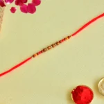 Earth-Toned Wooden Beads – RK-151 Rakhi on Soft Red Thread