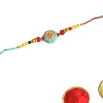 Turquoise Traditional Rakhi – RK-55 | Red-Blue Thread with Golden Beads & Enamel Center - Image 3