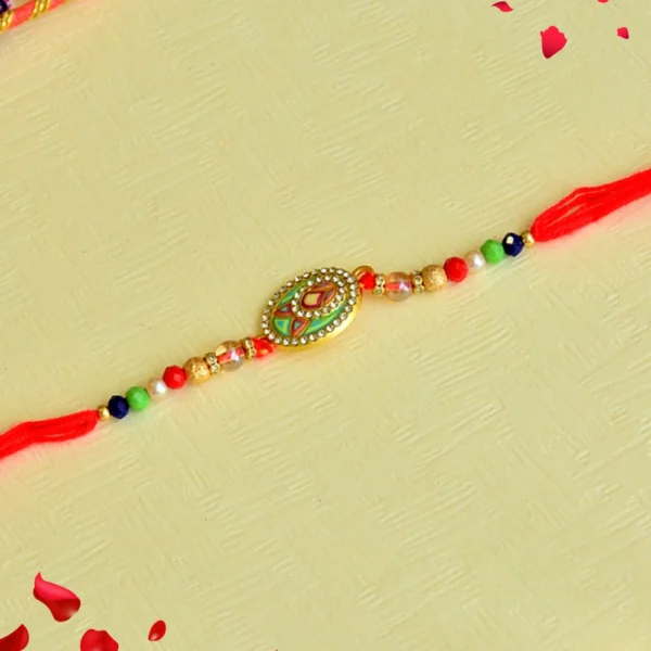 Classic Red Thread Rakhi – RK-62 | Handcrafted Oval Dial with Multicolor Beads - Image 1