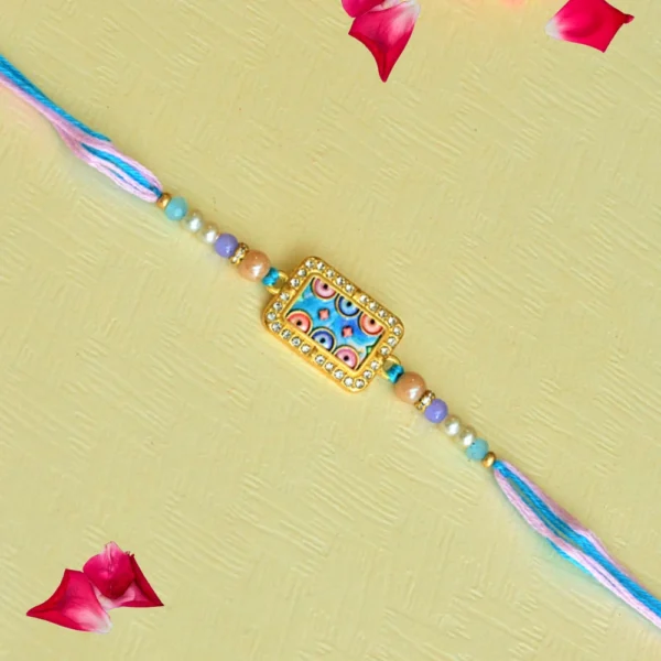 Pastel Charm Rakhi – RK-63 | Rectangle Enamel Dial with Beaded Elegance - Image 1