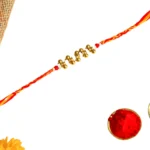 Handcrafted Red-Yellow Rakhi – RK-150 with Beaded Center - Image 3