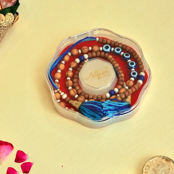 Double-Layered Evil Eye Rakhi – RK-107 | Wooden Bead Rakhi with Evil Eye & Blue Tassels - Image 2