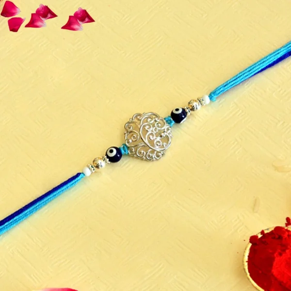 Elegant Evil Eye Pure Silver Rakhi – RK-122 | Silver Filigree Charm with Blue Thread for Style & Protection - Image 2