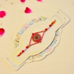 Radiant Floral Rakhi – RK-160 | Traditional Rakhi with Pearl Beads & Sun-Inspired Centerpiece for Brother - Image 2