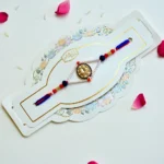 Kundan Oval Rakhi – RK-164 | Traditional Rakhi with Pearl Beads & Blue Thread Detailing for Brother - Image 2