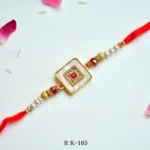 Royal Square Rakhi – RK-165 | Elegant Rakhi with Red Stone, Pearl Beads & Crystal Embellishment for Brother