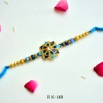 Peacock Feather Inspired Rakhi – RK-169 | Elegant Blue Enamel & Beads