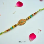 Divine Om Rakhi with Antique Finish & Beaded Elegance – RK-178