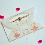 RK-180 Divine Ganesha Rakhi | Handcrafted Stone & Bead Rakhi for Brother - Image 2