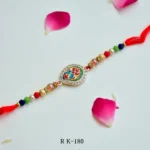 RK-180 Divine Ganesha Rakhi | Handcrafted Stone & Bead Rakhi for Brother