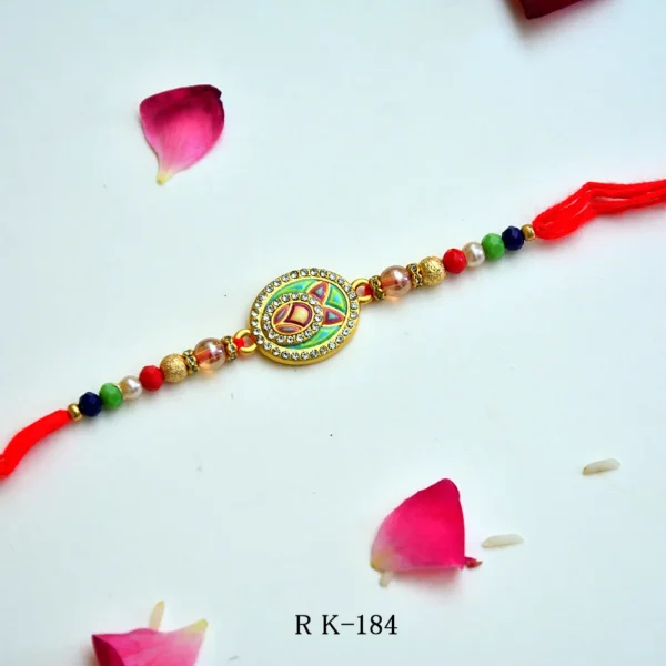 Peacock Grace Rakhi – RK-184 | Elegant Enamel Rakhi with Colorful Beads & Crystal Accents for Brother - Image 1