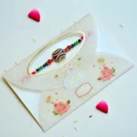 Wave Crest Rakhi – RK-187 | Unique Rakhi with Wavy Crystal Design & Colorful Beads - Image 2
