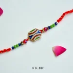 Wave Crest Rakhi – RK-187 | Unique Rakhi with Wavy Crystal Design & Colorful Beads