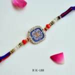 Mystic Mandala Rakhi – RK-188 | Designer Rakhi with Intricate Blue Enamel & Crystal Accents