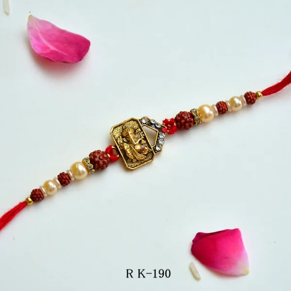Sacred Ganesha Rakhi with Rudraksha & Pearls – RK-190 - Image 1