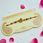 Graceful Leaf Drop Rakhi – RK-193 | Designer Rakhi with Green-Yellow Enamel - Image 2