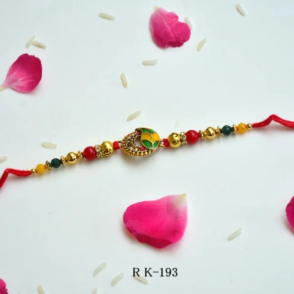 Graceful Leaf Drop Rakhi – RK-193 | Designer Rakhi with Green-Yellow Enamel - Image 1