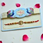 Ram Darbar Rakhi – RK-200 | Traditional Rakhi with Antique Finish Centerpiece & Golden Beads - Image 2