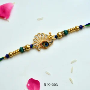 Peacock Feather Rakhi – RK-203 | Elegant Rakhi with Kundan Work & Blue-Green Beads