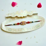 Traditional Meenakari Rakhi – RK-204 | Red & Blue Enamel Work Rakhi with Golden Beads - Image 2