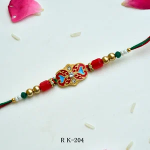 Traditional Meenakari Rakhi – RK-204 | Red & Blue Enamel Work Rakhi with Golden Beads