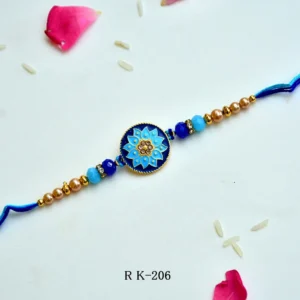 Royal Blue Lotus Mandala Rakhi – RK-206 | Meenakari Round Dial Rakhi with Crystal Accents