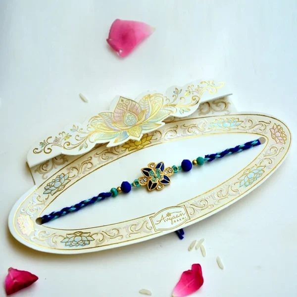 Elegant Blue Floral Rakhi – RK-207 | Enamel Flower Design with Crystal Detailing & Braided Thread - Image 2