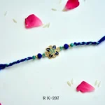 Elegant Blue Floral Rakhi – RK-207 | Enamel Flower Design with Crystal Detailing & Braided Thread