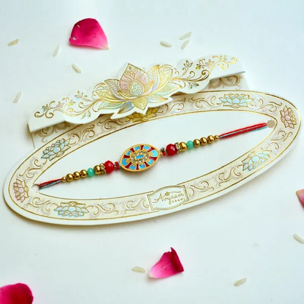 Royal Shield Rakhi – RK-208 | Elegant Rakhi with Red & Blue Enamel Centre and Golden Beads - Image 2
