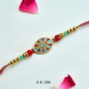 Royal Shield Rakhi – RK-208 | Elegant Rakhi with Red & Blue Enamel Centre and Golden Beads