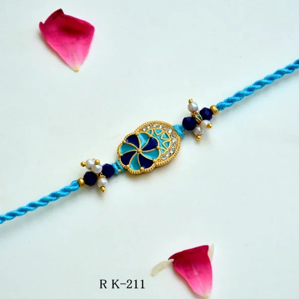 Azure Petal Rakhi – RK-211 | Charming Blue Floral Rakhi with Pearl Clusters & Beaded Thread