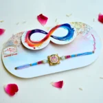 Lotus Elegance Rakhi – RK-213 | Artistic Lotus Design Rakhi with Pink & Blue Beads - Image 2