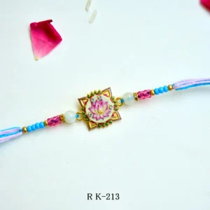 Lotus Elegance Rakhi – RK-213 | Artistic Lotus Design Rakhi with Pink & Blue Beads