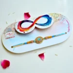 Peach & Aqua Stone Rakhi – RK-214 | Elegant Beaded Rakhi with Circular CZ Pendant - Image 2